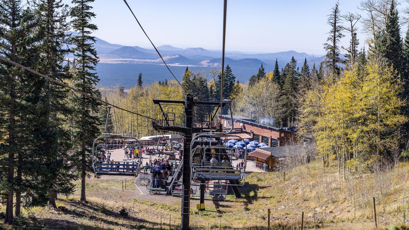 The Agassiz chairlift running through fall color at Arizona Snowbowl above Flagstaff