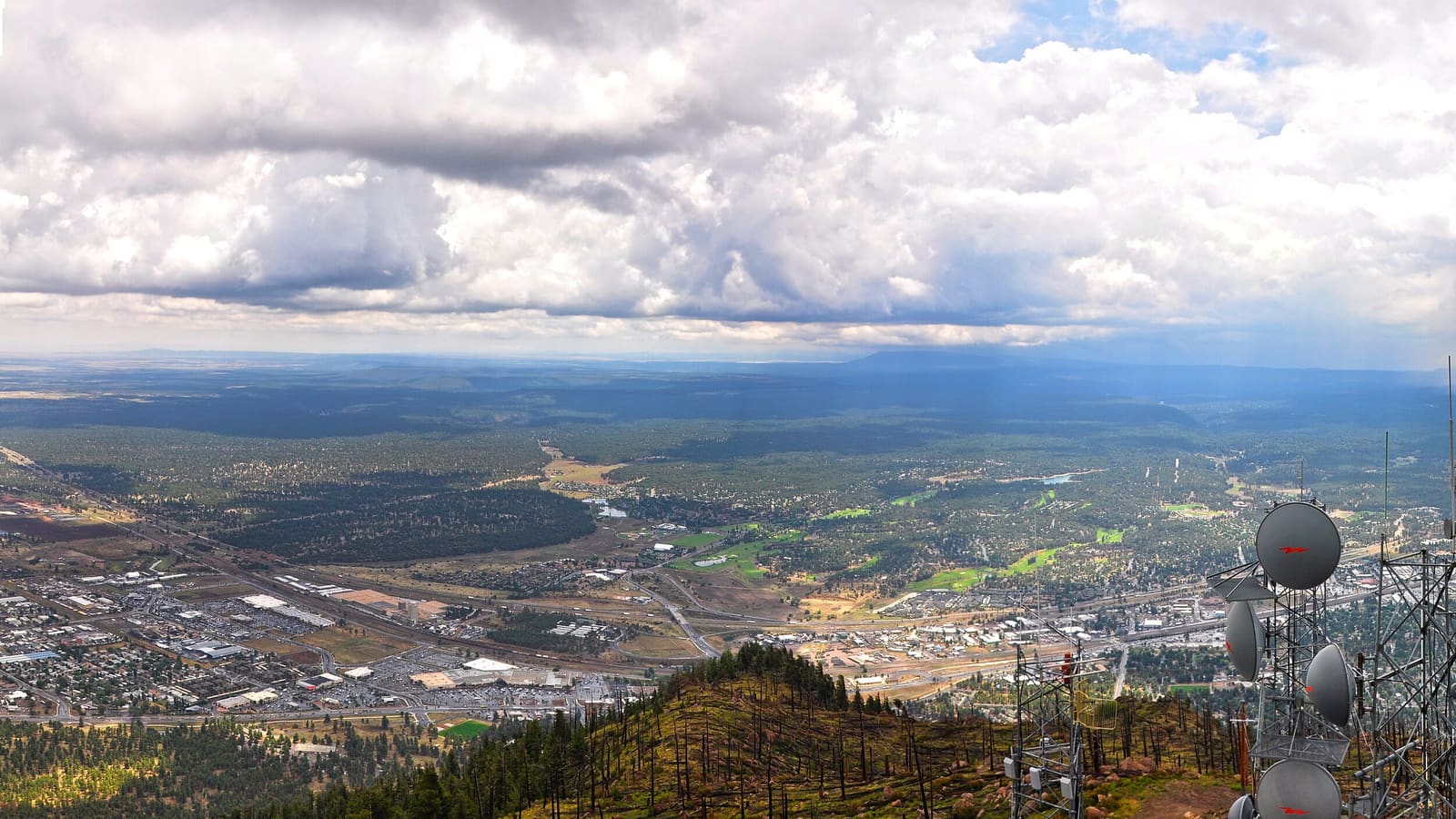 The view west over Flagstaff and the surrounding forest from the Mount Elden Lookout