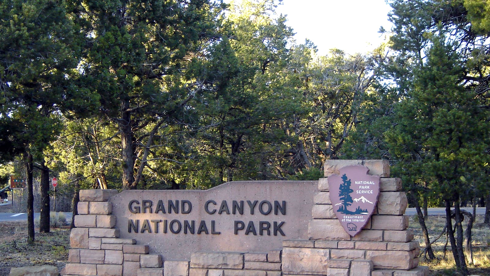 The Grand Canyon National Park South Entrance sign, the arrival point for visitors driving in from Phoenix, Las Vegas, or Flagstaff