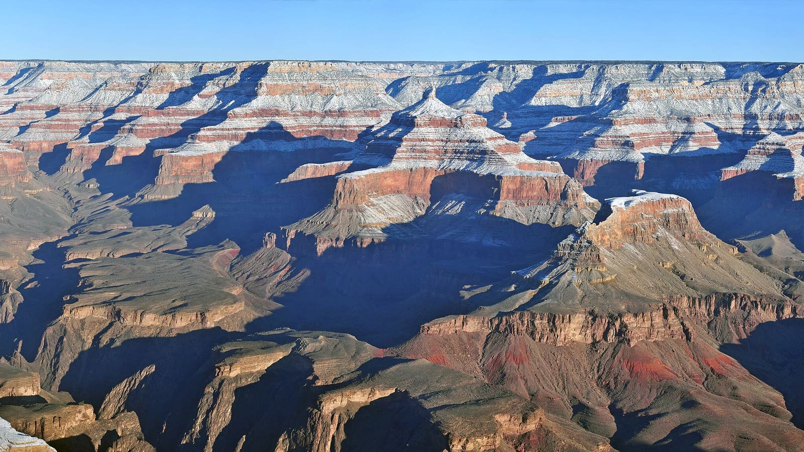 A snowy winter view of the Grand Canyon from Yavapai Point on the South Rim