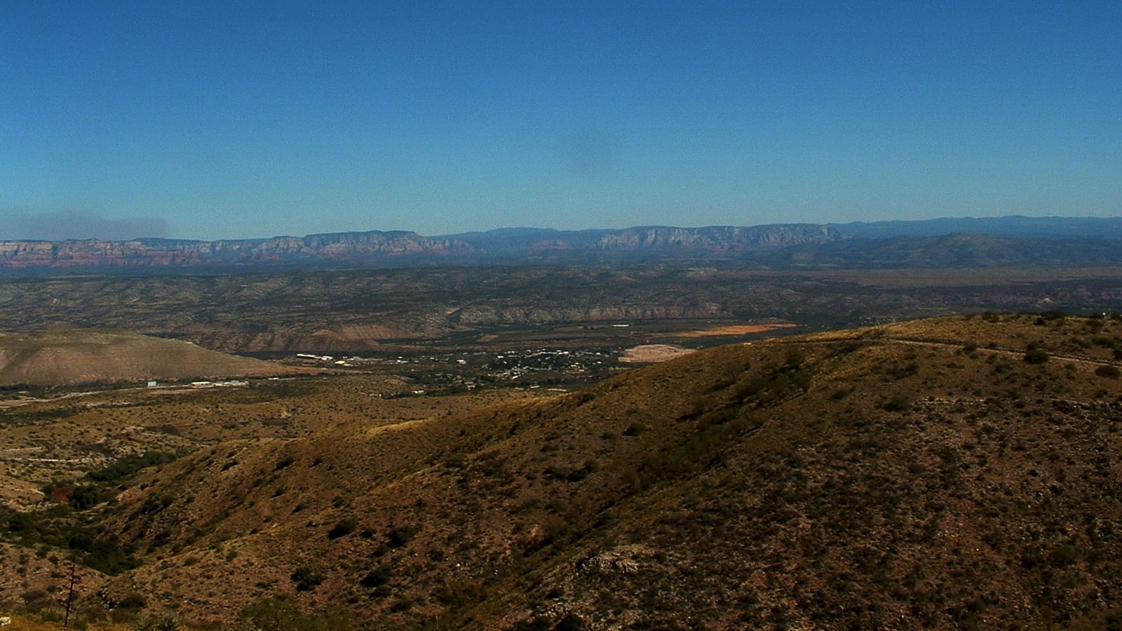 A wide view of the Verde Valley floor as seen from a former mining company overlook above Jerome.