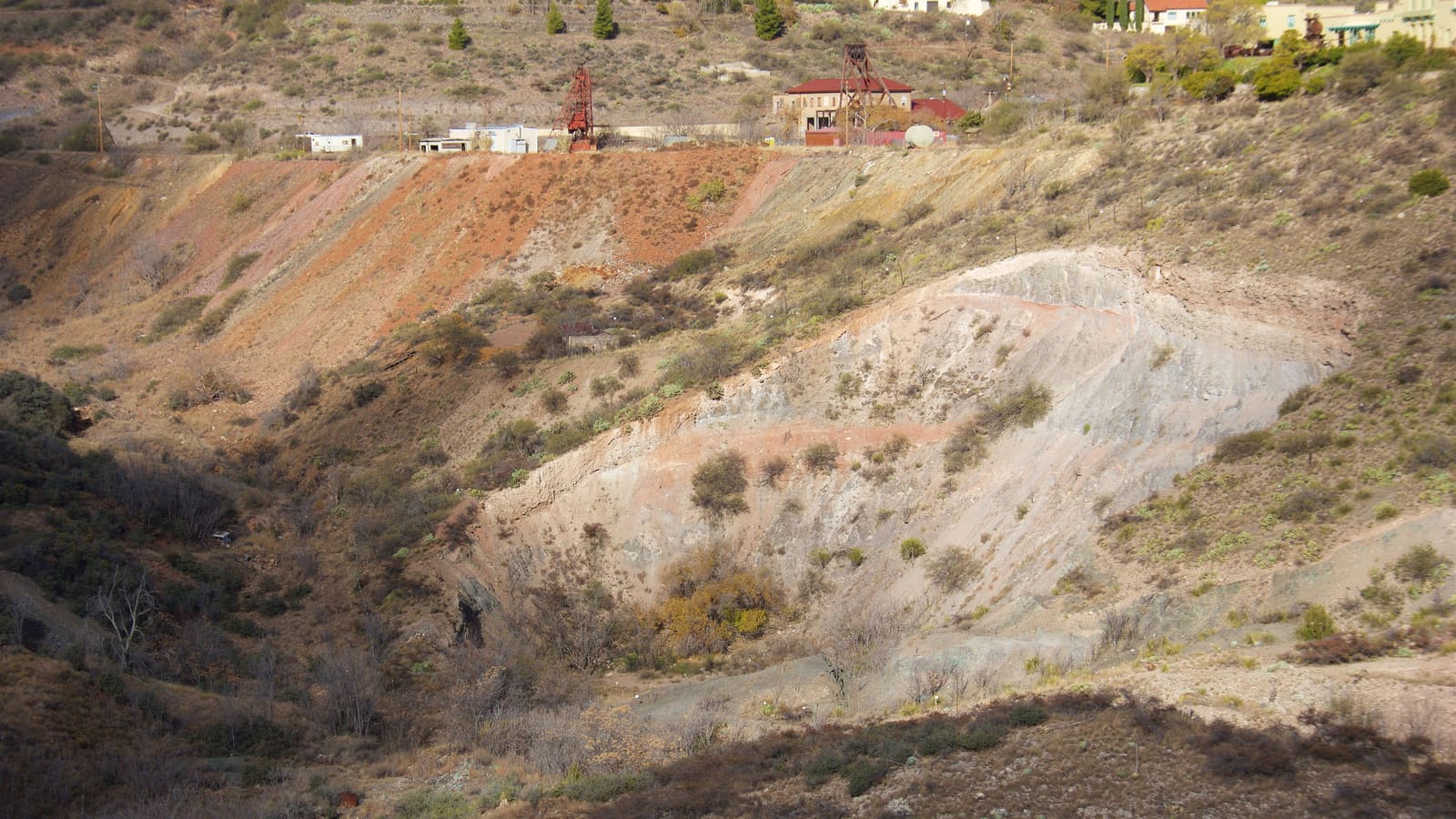 Jerome, Arizona's buildings stacked up the steep slope of Cleopatra Hill above the Verde Valley.