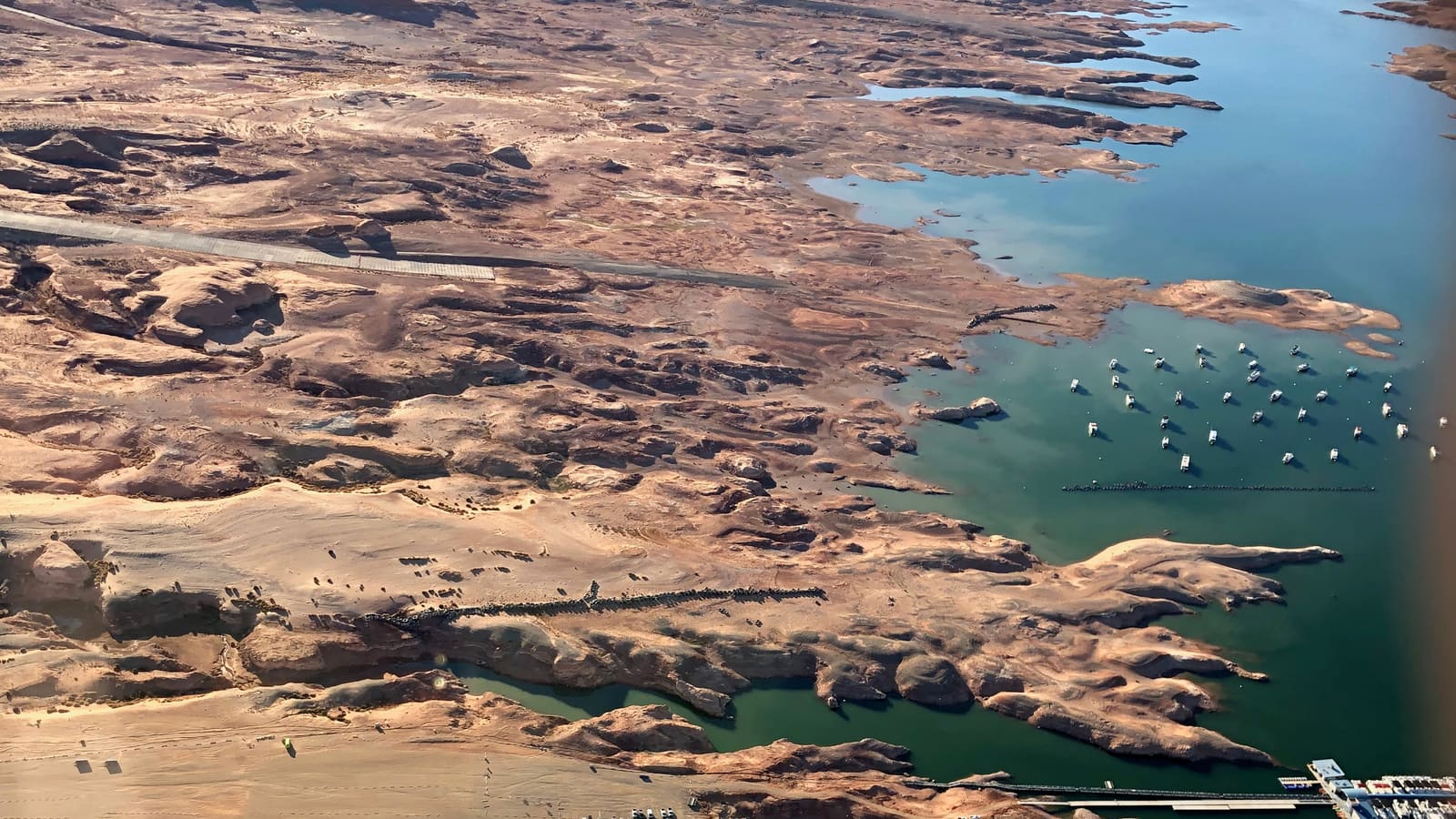 Aerial view of the docks and boats at Bullfrog Marina on Lake Powell, Utah, in March 2022