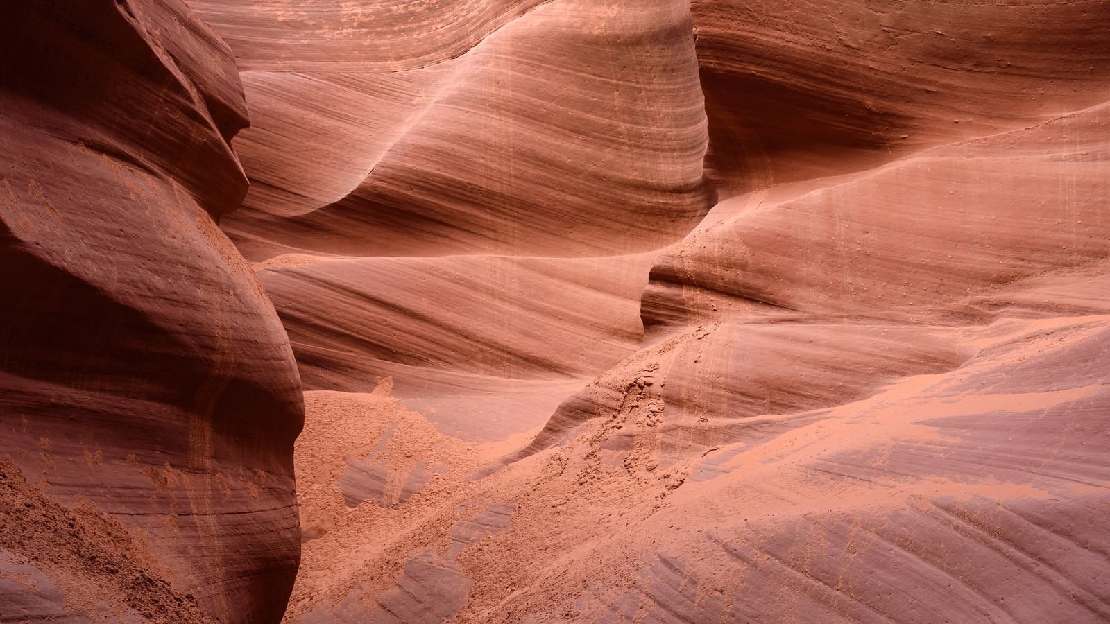 Smooth, curving red sandstone walls inside Lower Antelope Canyon near Page, Arizona