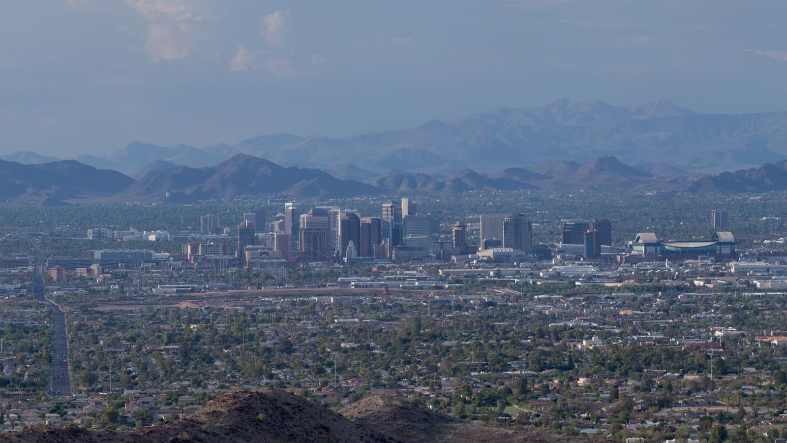 The downtown Phoenix, Arizona skyline on a clear day, seen from South Mountain