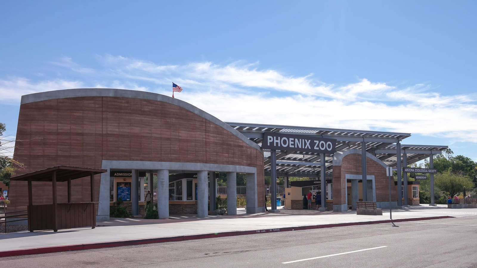 A pathway and animal habitats at the Phoenix Zoo in Arizona