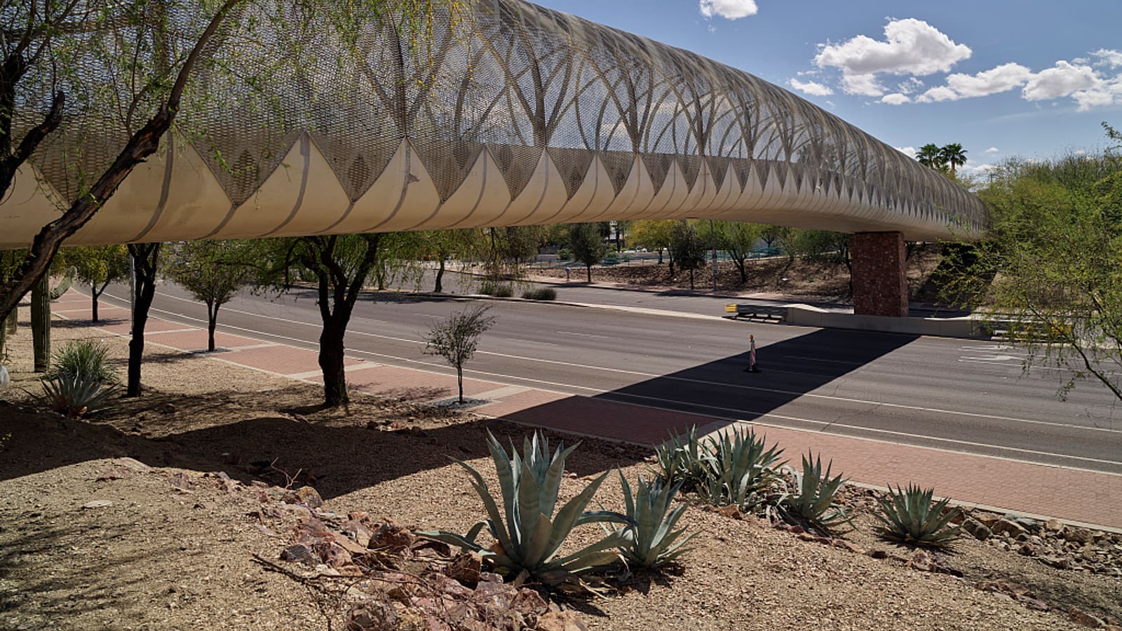 The Rattlesnake (Diamondback) Bridge, a rattlesnake-skeleton-shaped pedestrian bridge over Broadway Boulevard in Tucson