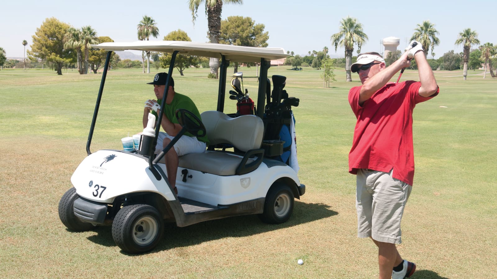 Golfers playing a round at Desert Hills Municipal Golf Course in Yuma, Arizona.