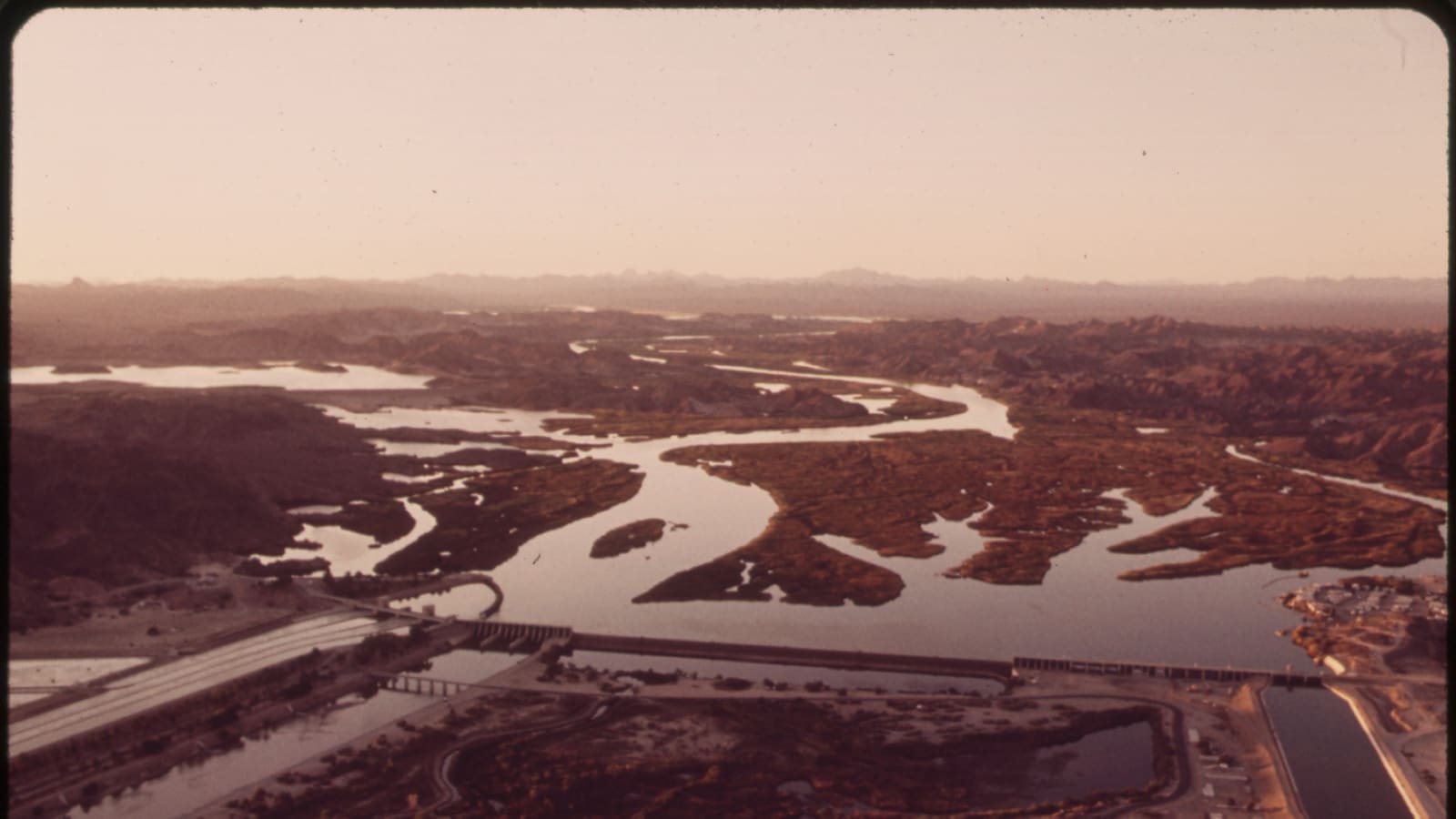 Aerial view of Imperial Dam and the Colorado River backwaters north of Yuma, Arizona, in an archival photograph